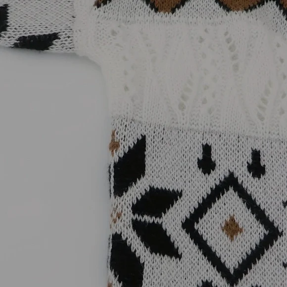 Nordic Snowflakes Open Knit Cardigan
Eclectic Grandpa Sweater - Picture 8 of 9